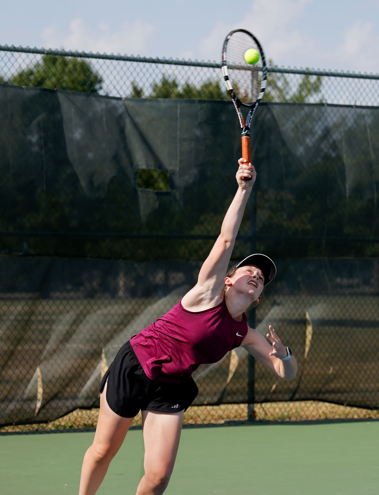 Jayna Davison serves the ball